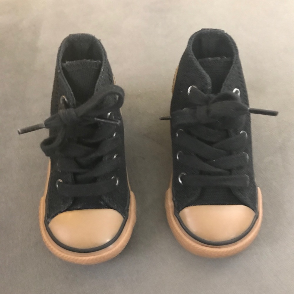 Converse Chuck Taylor high top sneaker in size 4.